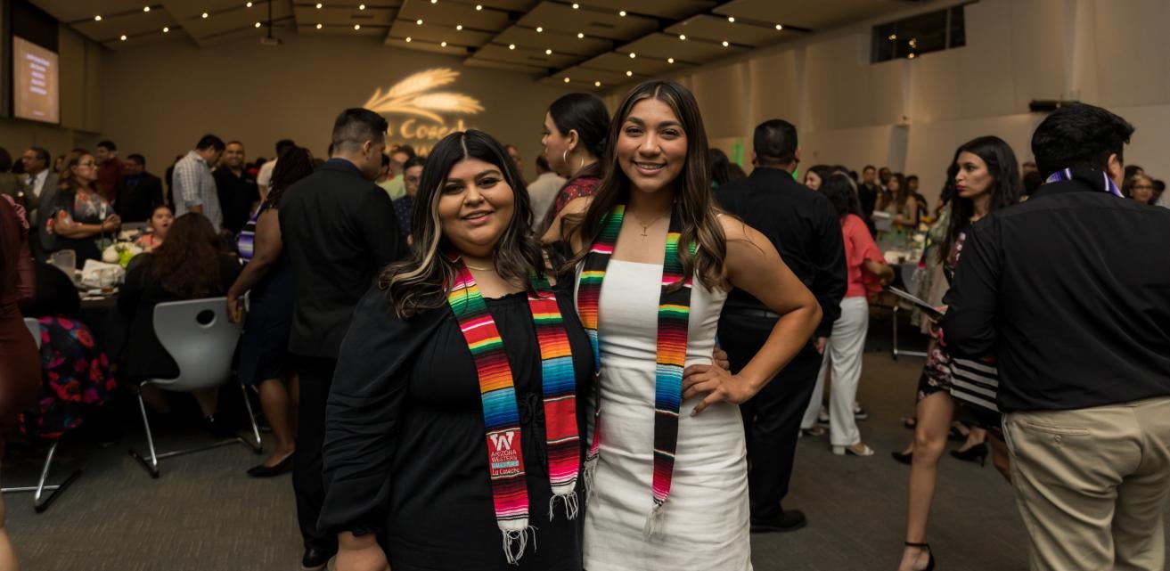 Two students at La Cosecha event